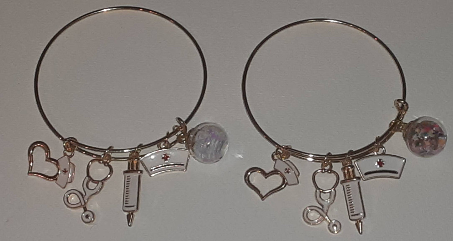 Gold expandable charm bracelet "Nurse"charms
