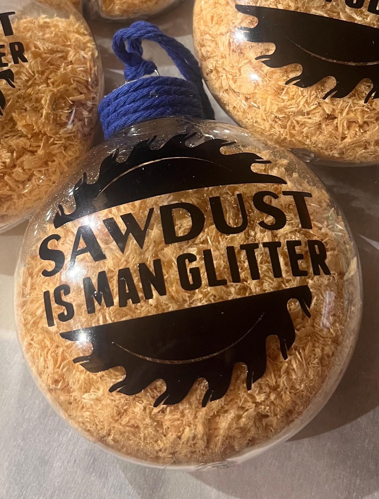 Unique ornamentgift idea, keep for your tree.”Sawdust is Man Glitter” acrylic ornament.