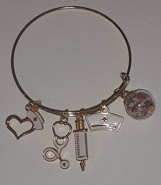 Gold expandable charm bracelet "Nurse"charms