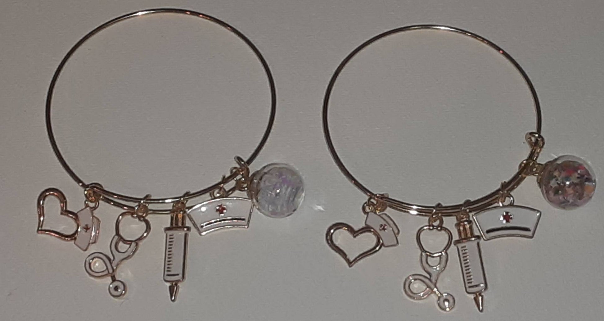 Gold expandable charm bracelet "Nurse"charms